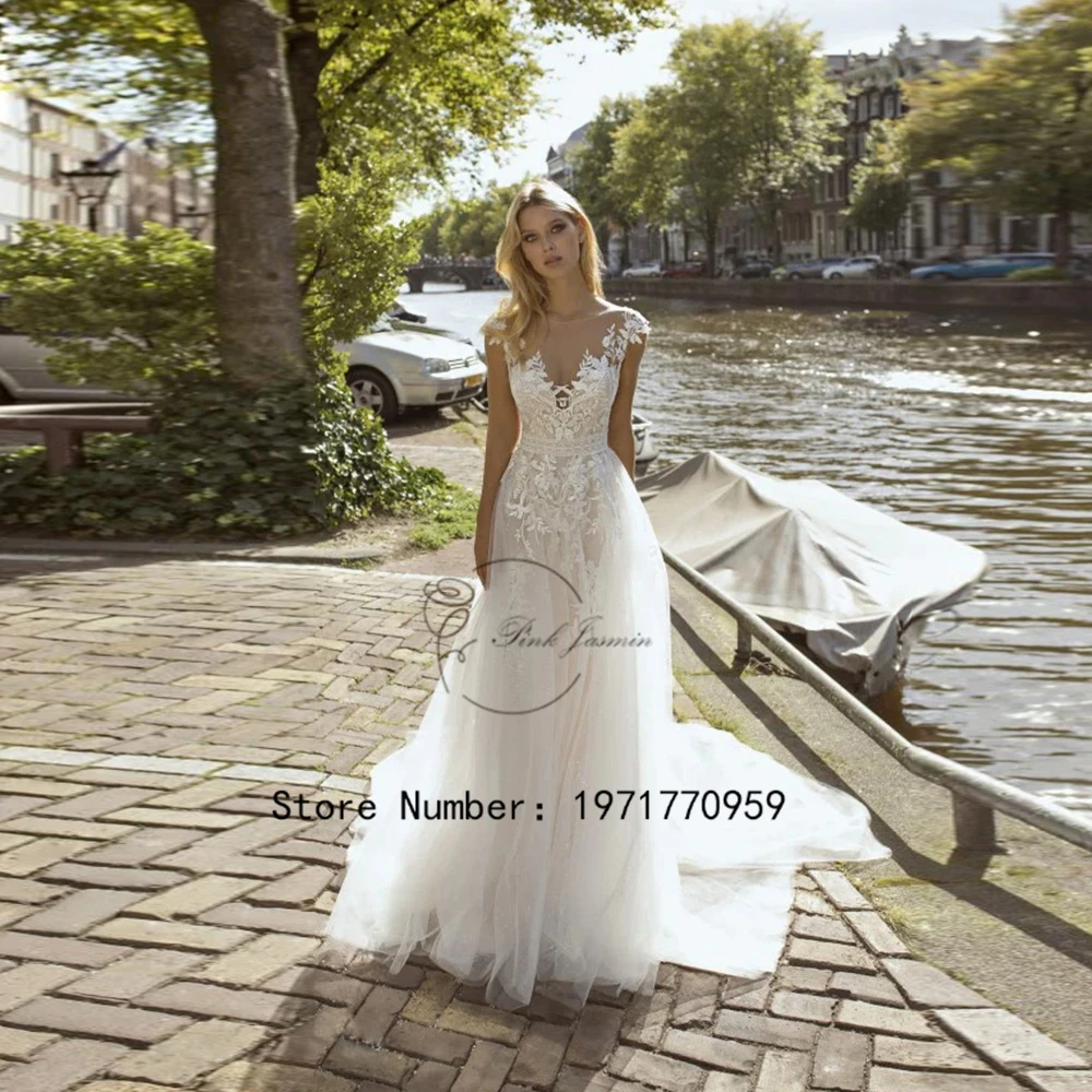 

Morden Civil Lace Wedding Dresses Scoop Neck Cap Sleeves Applique Elegant Bride Gowns Button Back A-Line vestido de noiva 2024