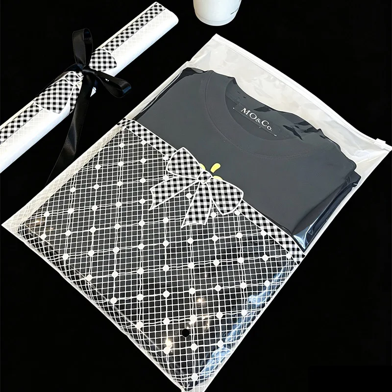 50pcs-bow-new-design-zipper-self-sealing-clothing-packaging-bag-dust-proof-bag-translucent-pe-bag-clothing-store-packaging-pouch
