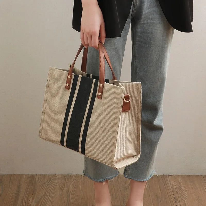 Bolso grande de lona para mujer, Cartera de lujo Vintage a rayas, maletín portátil de negocios, estilo coreano, novedad de 2023