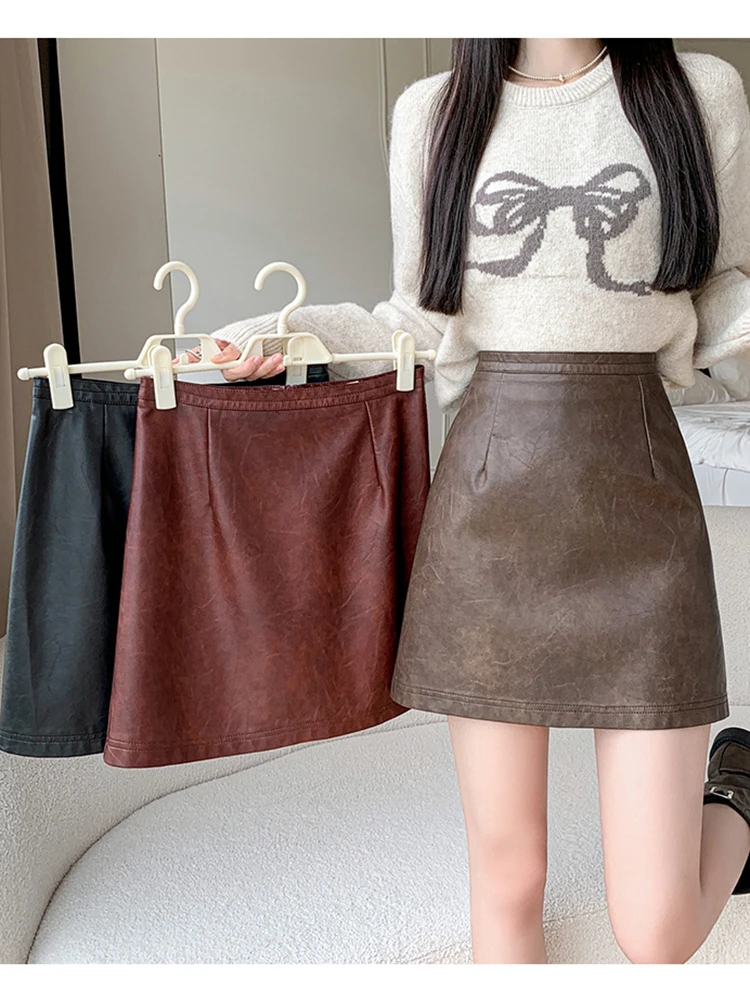 

New 2024 Winter Mini Leather Skirt Women Fashion Streetwear High Waist A-Line Wrap Short Skirts Vintage Brown Red Black Faldas