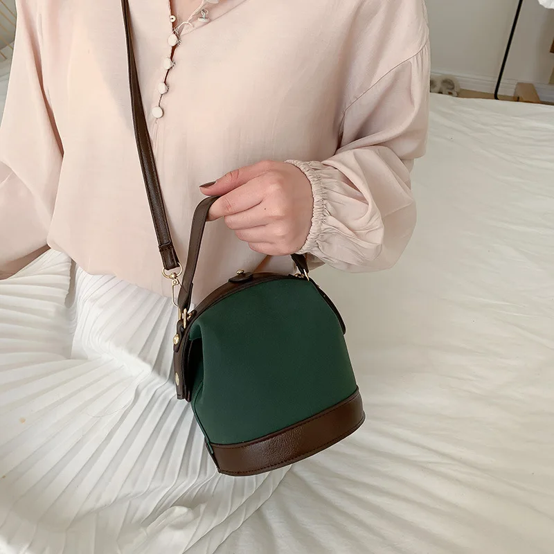 O mini saco pequeno feminino 2025 nova primavera e verão moda portátil fosco bolsa de ombro yangqi crossbody balde sacos