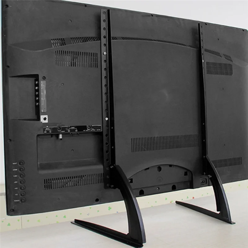 

Supersized Universal TV Stand: Height - Adjustable Legs Support TVs up to 55 Inches and 60 Kg