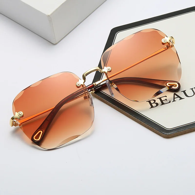 

New Fashion Inner Trimming Sunglasses Metal Personality Frameless Ocean Lens Glasses Sunglasses for Women