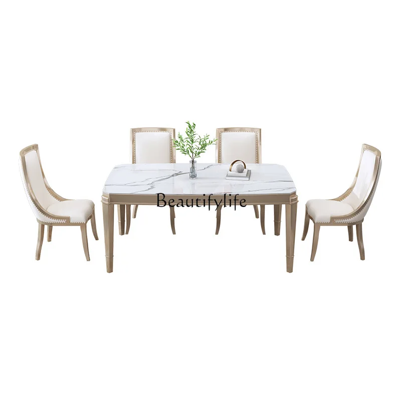 

French light luxury rock slab dining table modern simple rectangular solid wood dining table