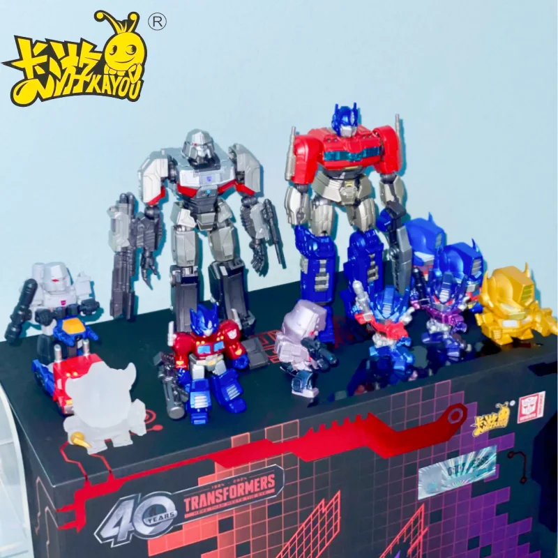 Nuevo KAYOU Transformers caja de juego de muñecos de goma 40 ° aniversario caja ciega de la guerra de chispa Optimus Prime Mini juguete Megatron de goma regalo para niños