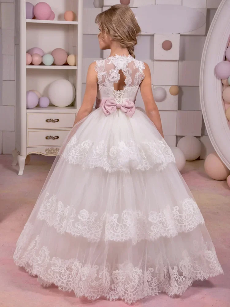 Sukienka dla dziewczynki na wesele, elegancka, księżniczka, na urodziny, bal, z białej koronki, warstwowa, z aplikacjami z cekinów i kokardą.