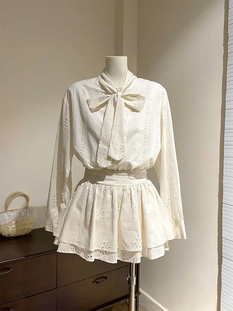 الخريف الفرنسية أنيقة 2 قطعة مجموعة المرأة الشريط الجوف خارج تصميم الرجعية القمم + Harajuku شيك تنورة صغيرة الإناث الكورية نمط الملابس