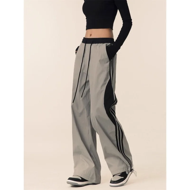 Pantaloni da donna minimalisti per il pendolarismo primavera estate tasche con coulisse impiombate pantaloni larghi Casual a vita alta dritti larghi