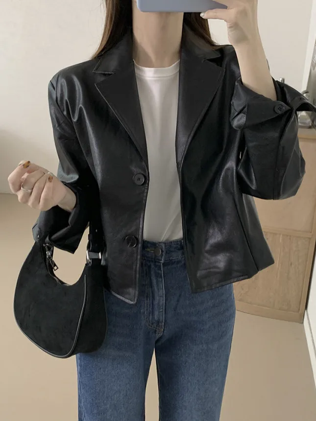 レトロな秋の女性用バイクスタイル長袖スーツカラーフェイクレザージャケットルーズフィット万能ショートコートアウター