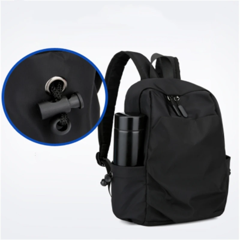 Mini Mochila pequeña para hombre, bolso escolar de hombro negro a la moda, de lona, de diseñador, impermeable, para viaje deportivo, 2023