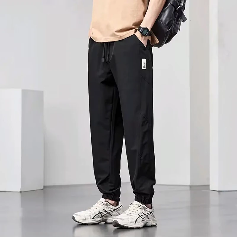 

Summer Casual Stretch Breathable Men Taper Leg Cargo Pants Trend Versatile Loose Straight Leg Male Harem Comfortable Trousers