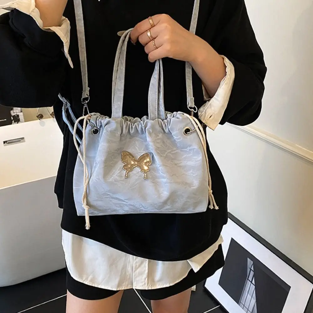 

Magnetic Buckle Silver Butterfly Backpack Butterfly Decor Metal Chain Drawstring Shoulder Bag Versatile Korean Style