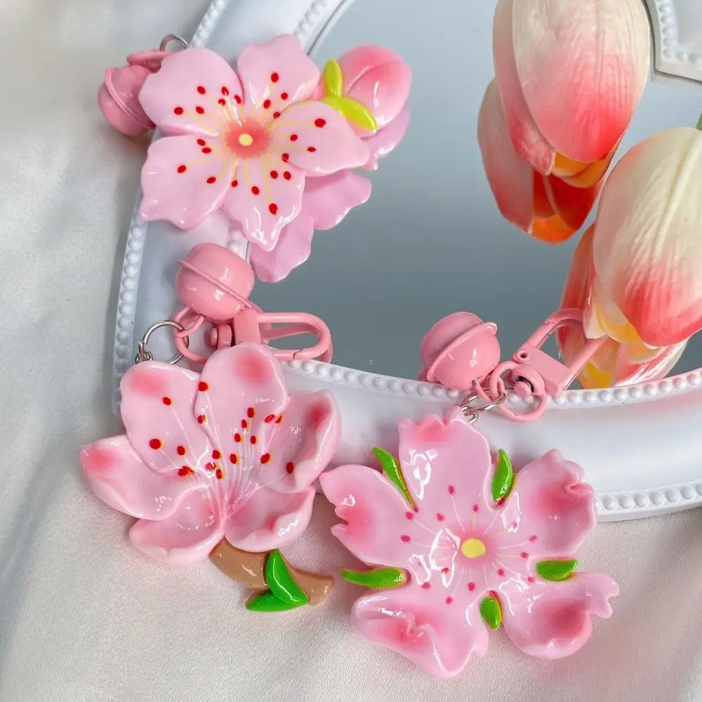 

Cute Resin Peach Flower Keychain Lotus Tulip Peach Blossom Pendant Bag Hanging with Bell Car Key Ring Gifts