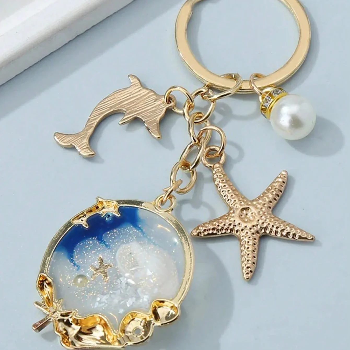 1pc Blue Ocean Themed Keychain Creative Keyring With Starfish, Dolphin And Seashell Pendant