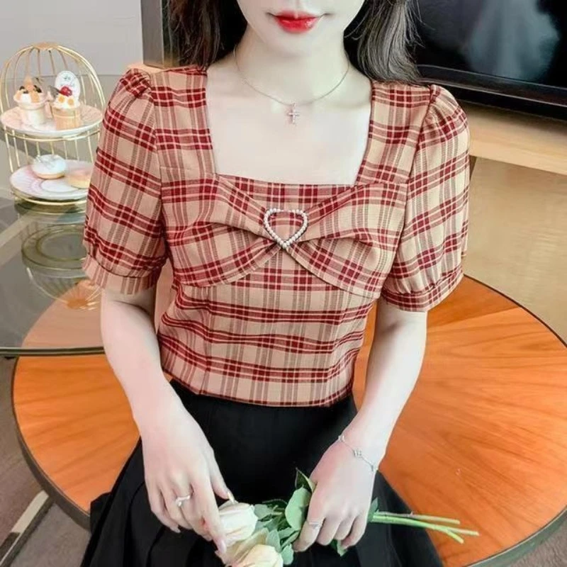 

Дизайнерский топ в французском стиле для женщин, лето 2026, новинка, в клетку, с короткими рукавами-фонариками, укороченный, нишевый дизайн