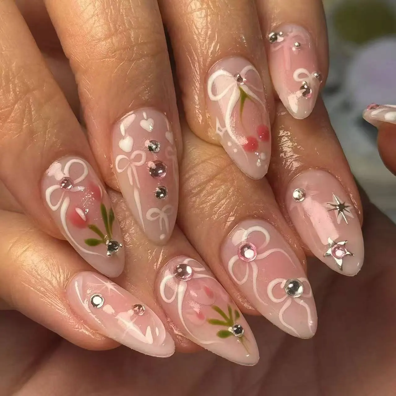 

24PCS Sweet Pink Blush French False Nails Cute Bowknot Star Floral Patterns Press on Nails Wearable Almond Fake Nails with Charm