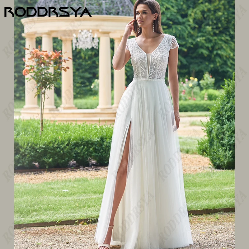 RODDRSYA-Robe de mariée dos nu en tulle bohème pour femme, col en V, manches cape A-Line, robe de patients de plage, haute fente, fête de la mariée bohèmeRobe de mariée dos nu en tulle bohème pour femme, col en V, manc