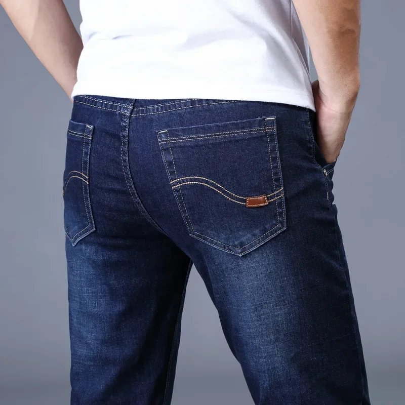 Pantalones vaqueros elásticos para hombre, Jeans clásicos elásticos de negocios, cómodos, lisos, rectos, largos, a la moda, novedad de 2023