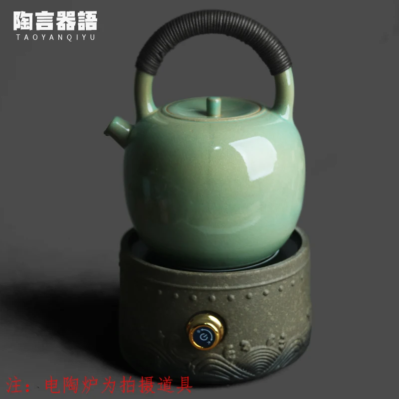 

“Fruit green soda-glazed rough earthenware round teapot with rattan handle for charcoal or electric burners”