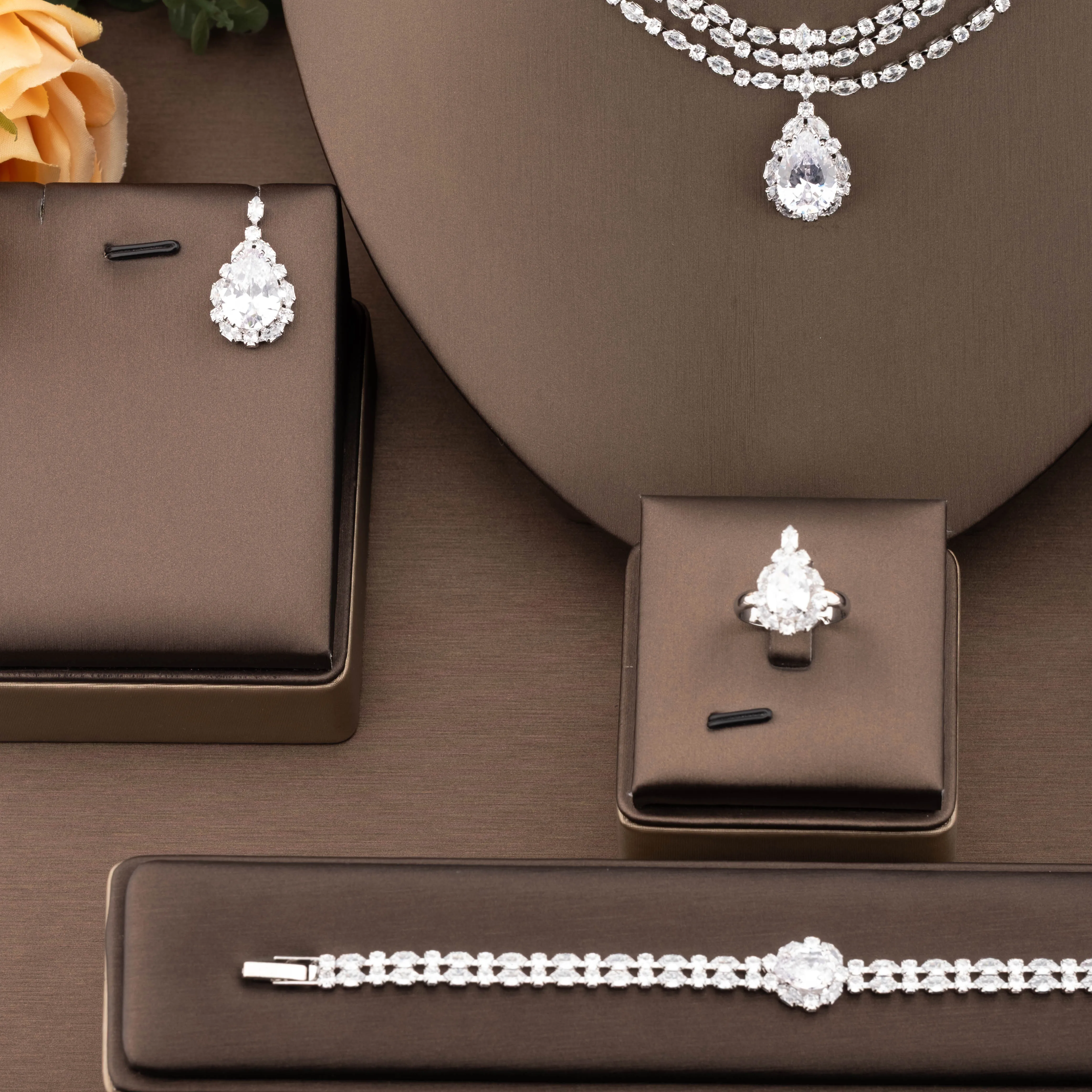 1 set of luxurious and elegant jewelry set with sparkling cubic zirconia, featuring a three-layer stacked large teardrop design, suitable for women to wear at weddings and banquets. Gift box not included