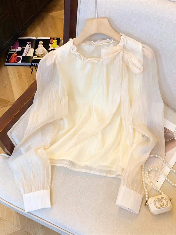 Autumn New Elegant Lady Solid Color Long Sleeved Loose Chiffon Shirt French Fashion Women's Woven Pearl Round Neck Tied Shirt