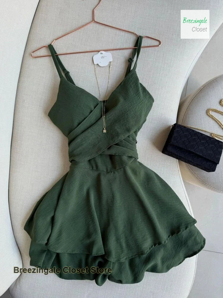 

French niche green suspender dress female summer new design sense temperament high sense beautiful luxury Joker short skirt.