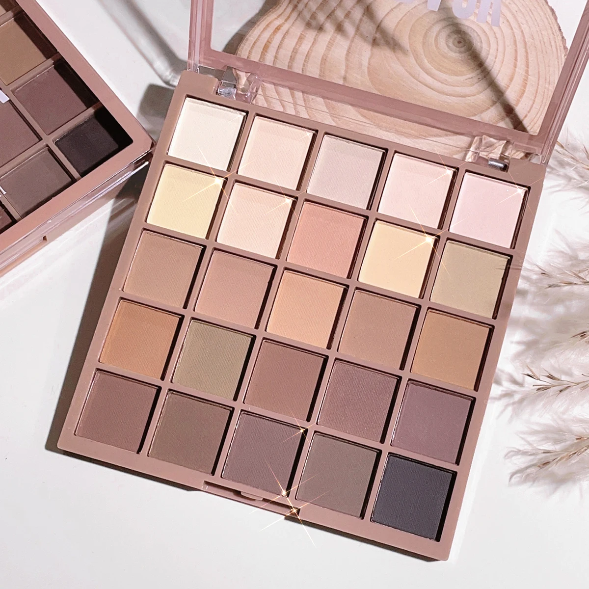 25-Color Eyeshadow Palette with Matte Brown and Nude Shades, highly pigmented and long-lasting for everyday makeup