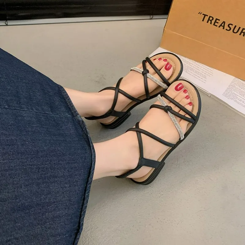 

2026 Roman Sandals Women Flat Bottom Fairy Style Summer New Soft Bottom Cross Thin Strap Beach Shoes Anti-Slip Low Cut Slip-On