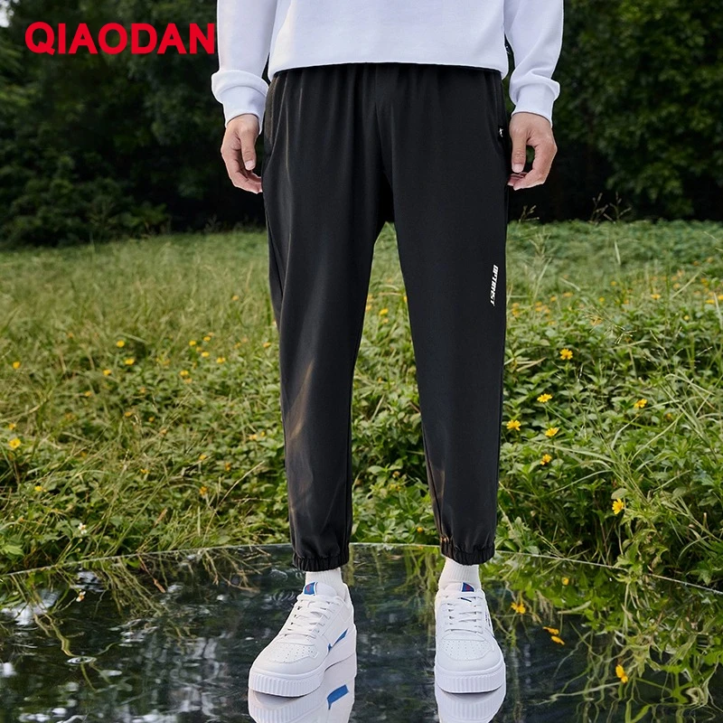 QIAODAN Men Woven Jogger Pants 2026 Zip Pocket Ankle Cuff Trousers Lightweight Breathable Outdoor Casual Sweatpants XYK13226338