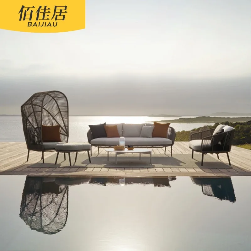 Nordic outdoor simple modern rattan sofa pedal rattan chair coffee table courtyard garden terrace bed weaving double