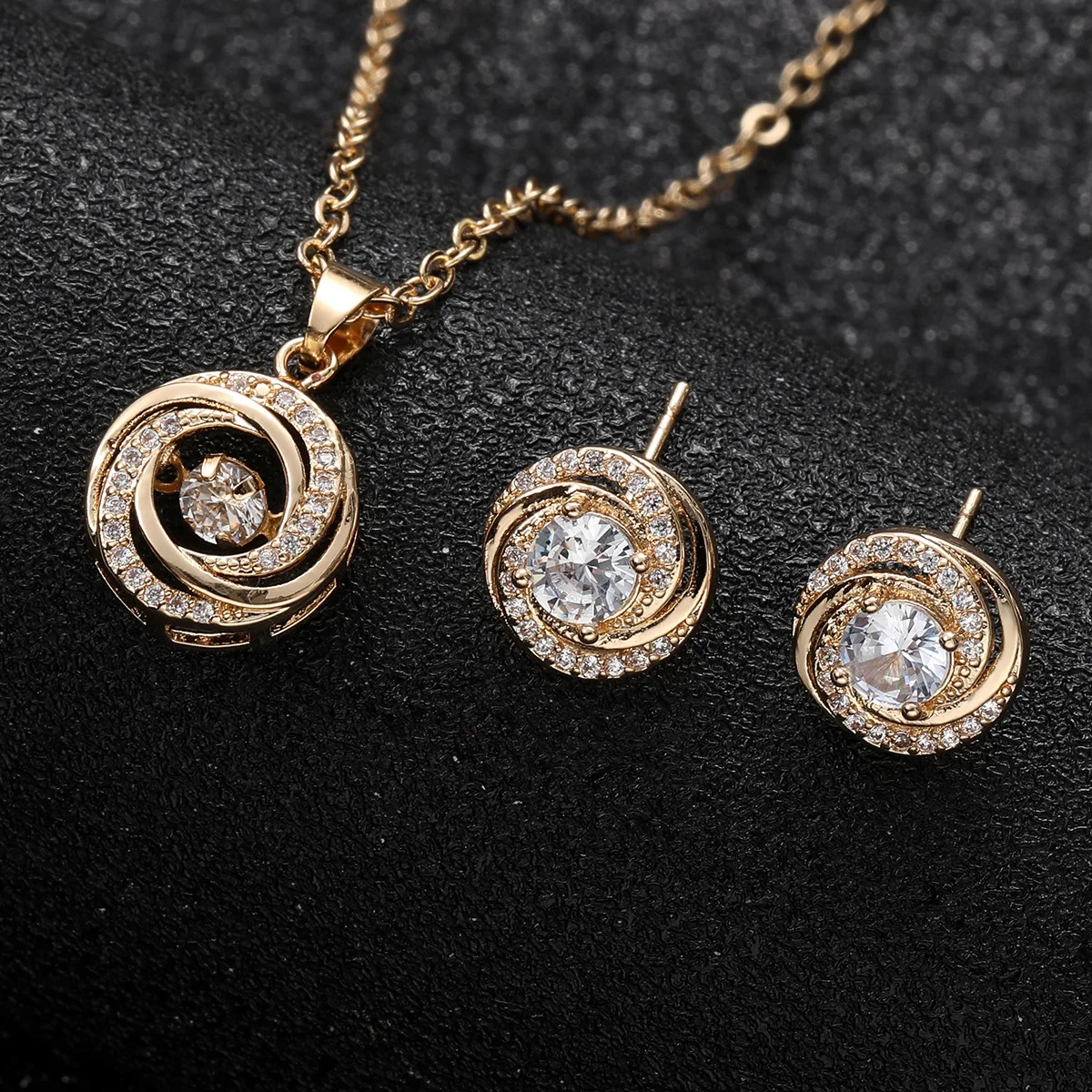 The new Stainless steel zircon spiral pattern circular ring pendant 2-piece jewelry set of Rotating Windmill Women\'s Accessories