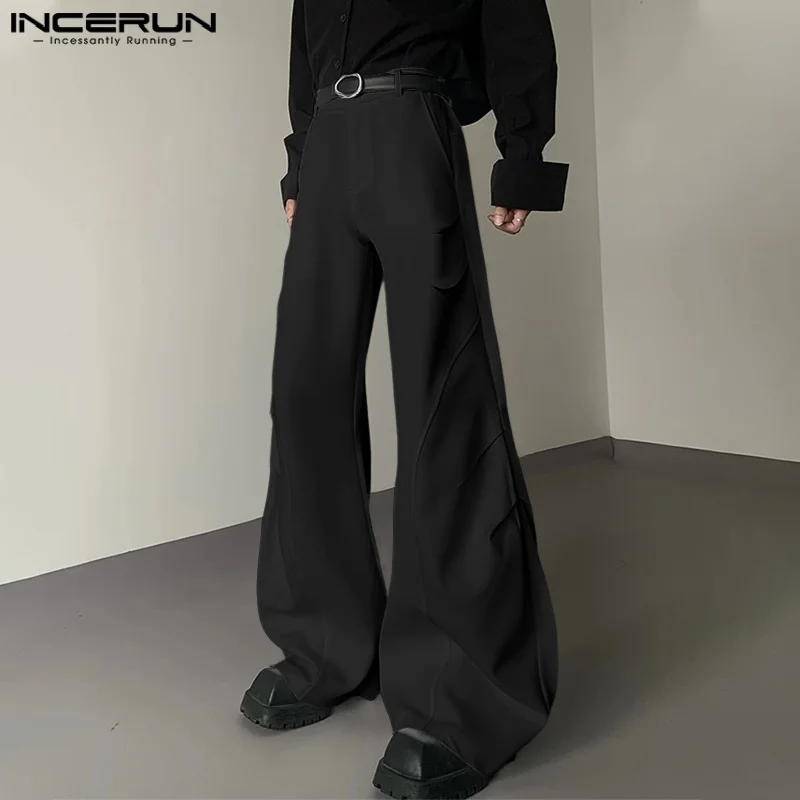 INCERUN Męskie Spodnie Jednolitego Koloru Zapinane na Guziki Joggersy Luźne Casualowe Spodnie z Plisami Męska Moda Streetwearowa Wygodne Spodnie Rozszerzane S-5XL