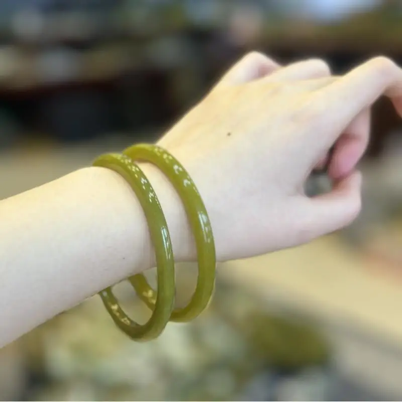 

Natural Xiuyu Gold Jade Jingle Bracelet