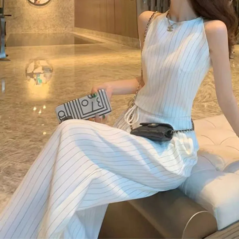 Small fragrance suit female 2024 summer new high sense niche temperament striped vest wide-leg pants two-piece.