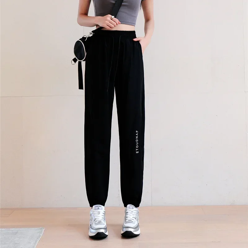 

2023 Summer Women's Fashionable Loose Breathable Tie Foot Quick Drying Pants High Waist Thin Ice Silk Casual Sports Pants