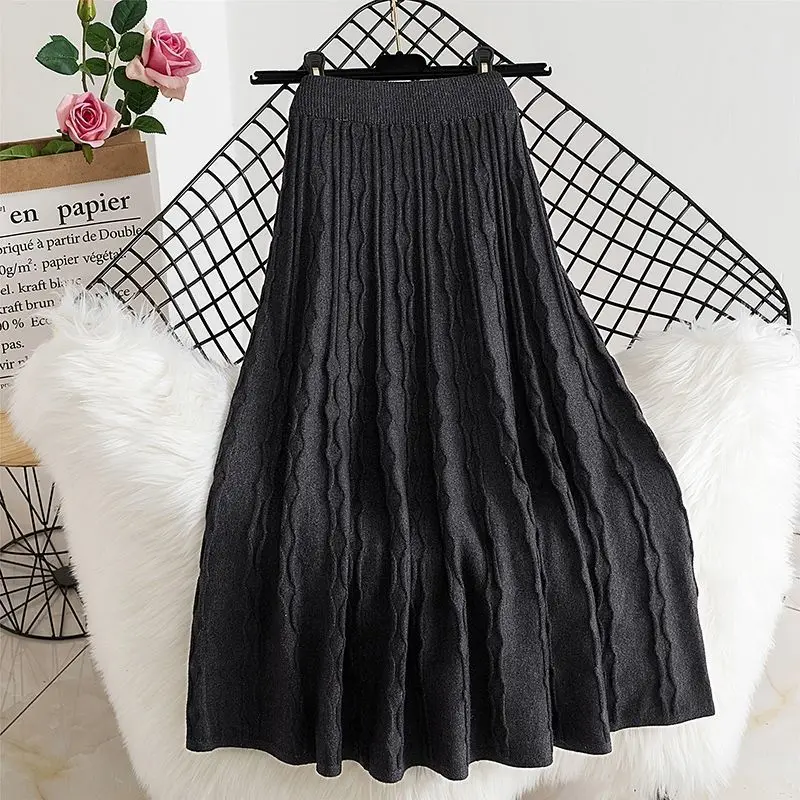 Solid color mid-length skirt women spring and autumn high waist thin knitted skirt a-line swing winter skirt wool long skirt