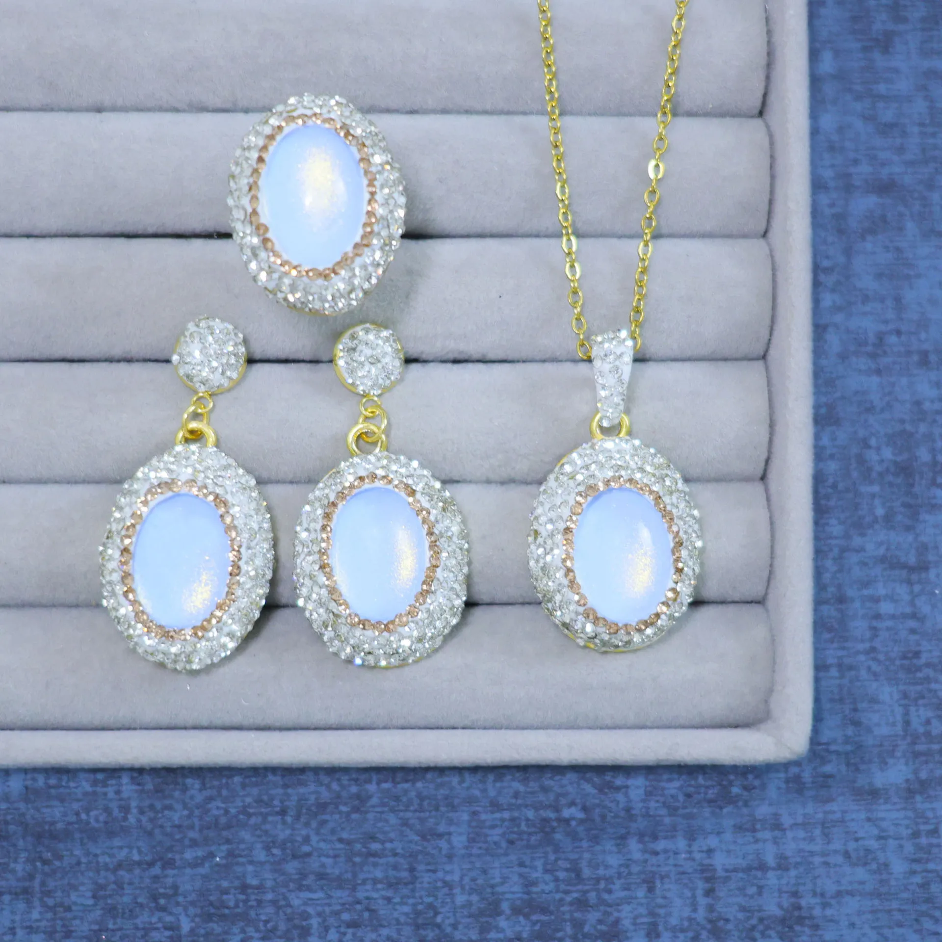 Original new handmade design crystal diamond oval lake blue light luxury inlaid three-piece jewelry factory direct sales