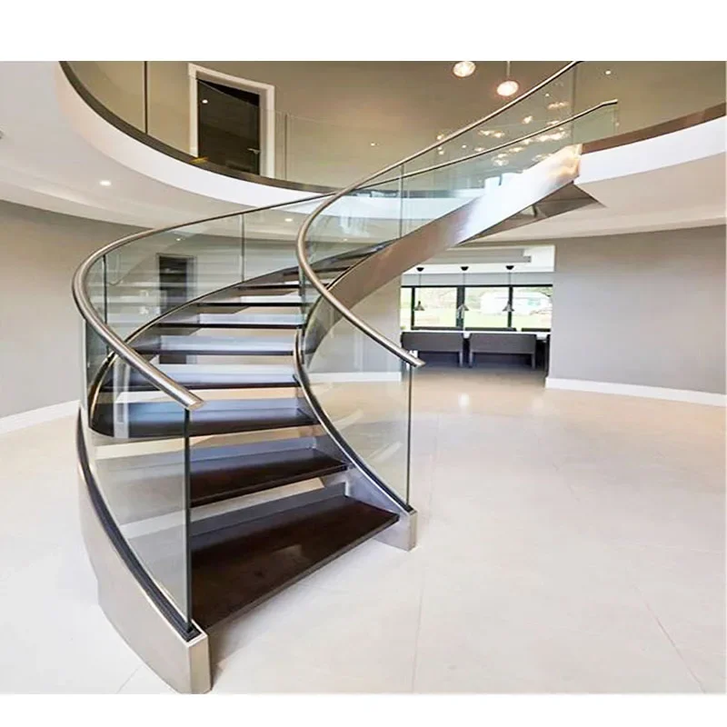 Modern curved staircase with glass balustrade and American red oak treads indoor use arc stair