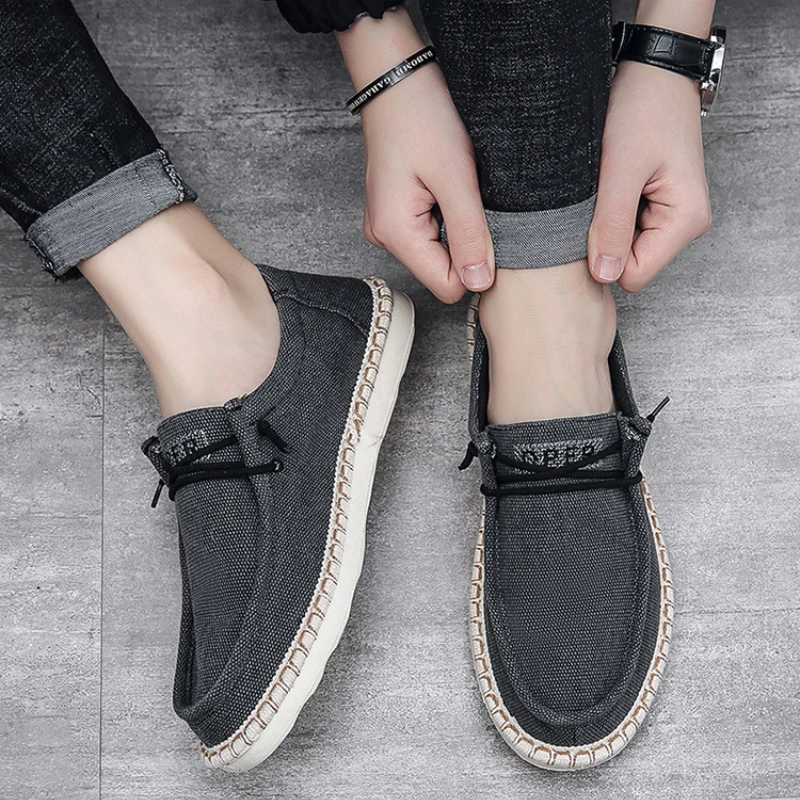 الرجال حذاء كاجوال 2026New حذاء قماش تنفس الكلاسيكية الدانتيل يصل المتسكعون أحذية قيادة لينة الرجال عدم الانزلاق أحذية رياضية Zapatos Hombre
