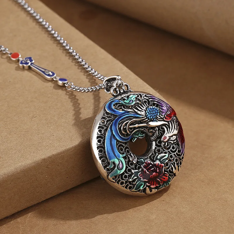 

Phoenix Ruyi Peony pendant necklace for women, retro enamel cloisonn é style, versatile sweater chain style.