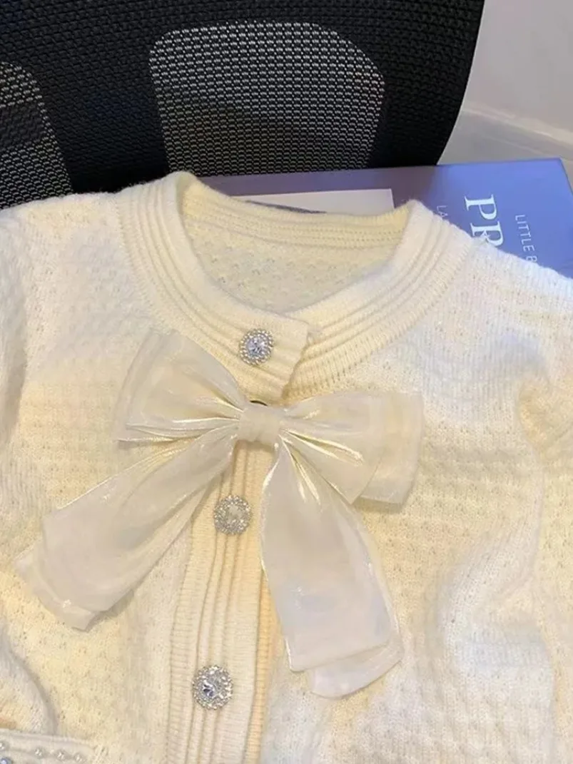 Elegant Bow Sweet Cardigan Sweaters New Women Loose Long Sleeve Fashion Knitted Coat Casual Korean O Neck Design Buttons Tops