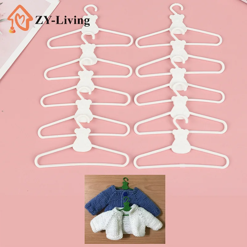 

10 шт. мини-вешалок белого цвета для кукольной одежды, пластиковые вешалки-зажимы для гардероба куклы