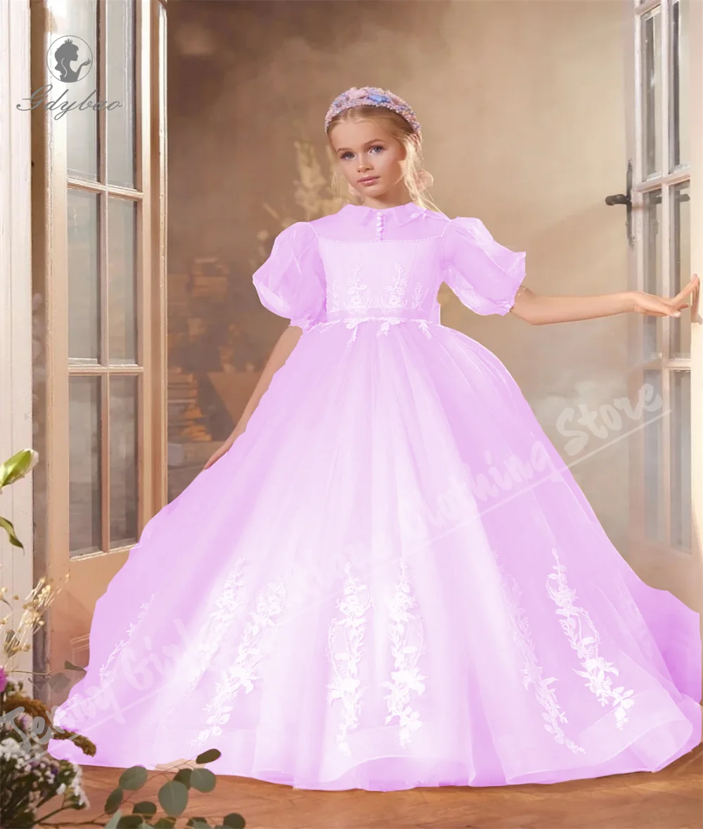 ชุดเจ้าหญิงหลอนสีชมพูที่มีเสน่ห์พร้อมแขนสั้นหวานปุยเด็กชุดวันเกิดสำหรับงานแต่งงาน