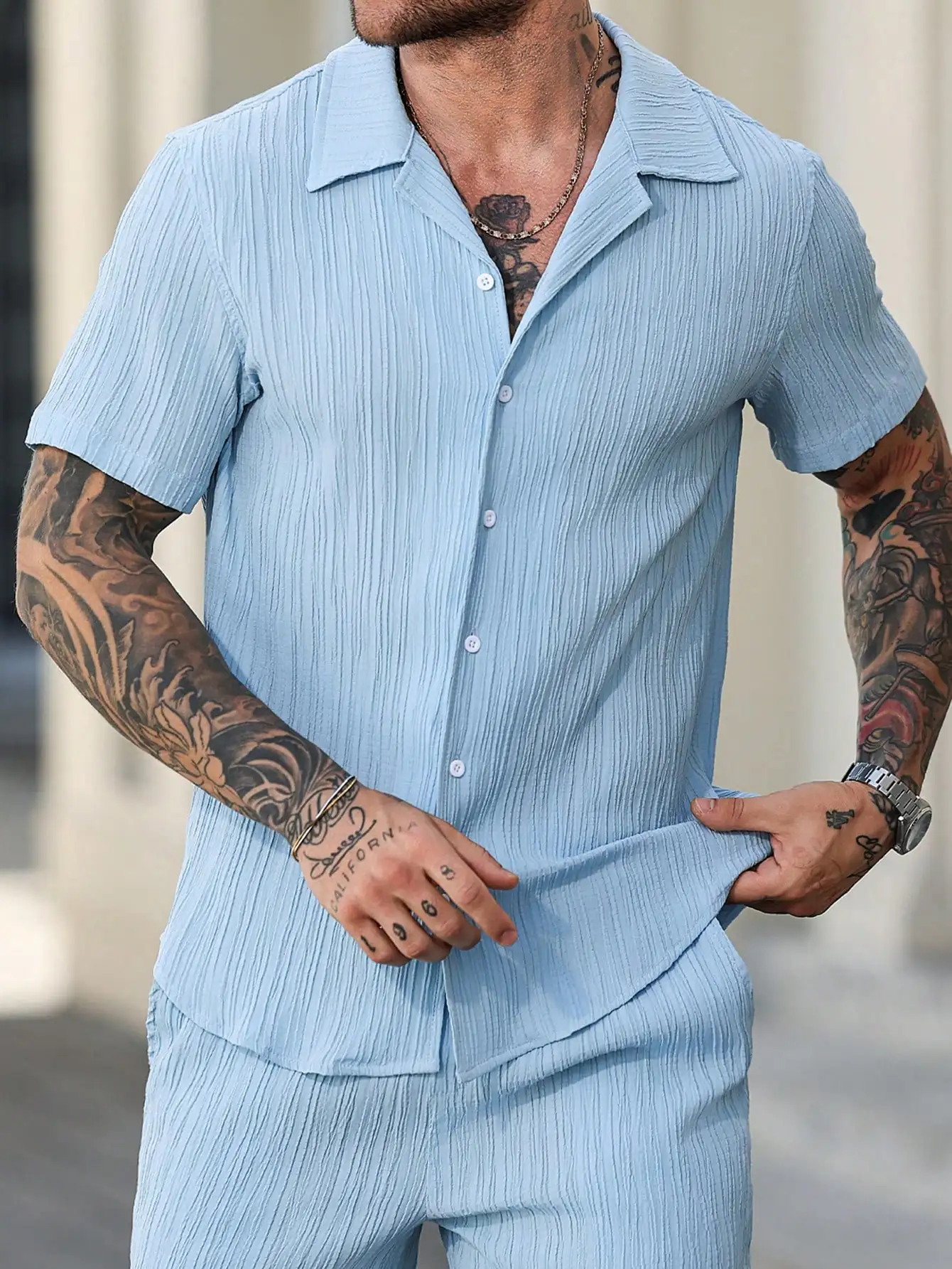 

Men's Light Blue Short Sleeve Casual Shirt with Pleated Texture and Lapel Collar