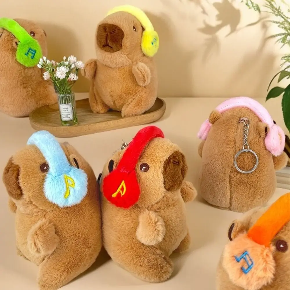 New Cute Capybara Pendant Plush Toy Key Chain Wearing Music Headphones Capybara Stuffed Animals Doll Bag Hanging Ornaments