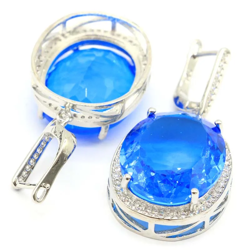 ต่างหูเงินประดับพลอยแทนซาไนต์สีม่วงขนาด 40x21 มม. ตัดละเอียดประณีต น้ำหนัก 17.5 กรัม เหมาะสำหรับผู้หญิง