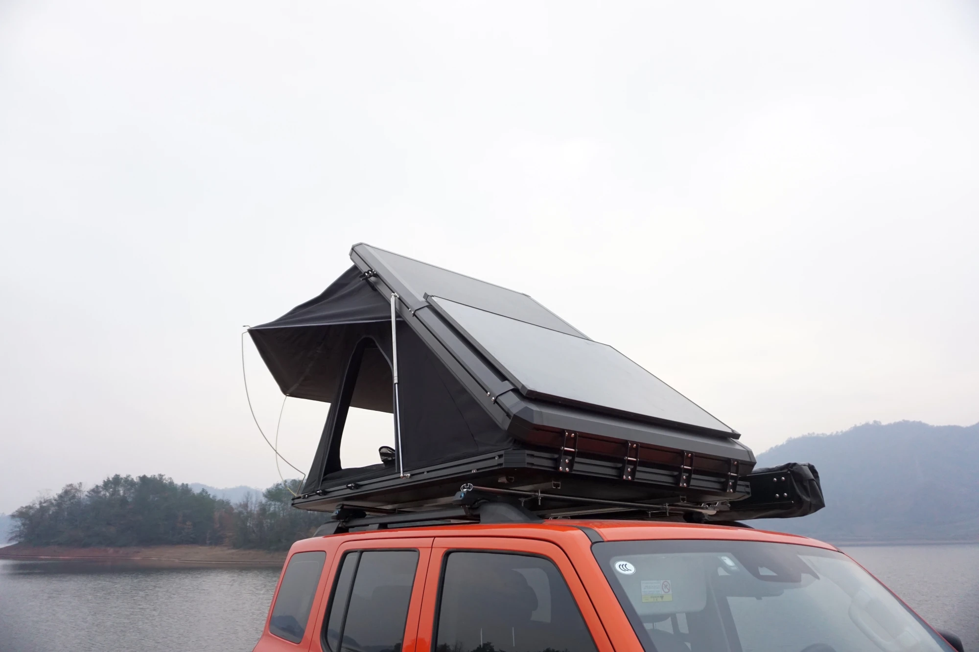 2025 iolina Compact Aluminum Hard Shell Auto Rooftop Tent Waterproof Canvas Roof Top for Outdoor Camping New SUV Tent Salecustom