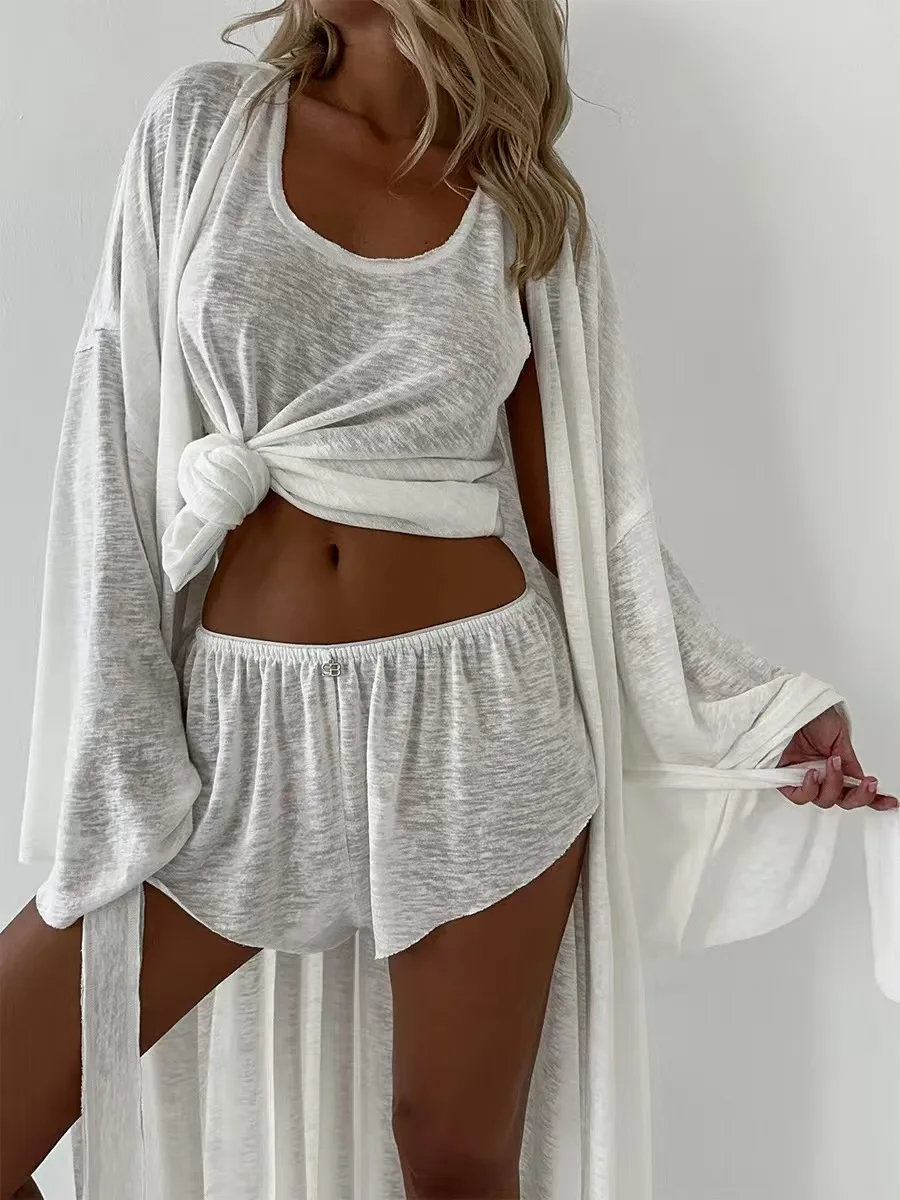 

Новый сексуальный комплект футболок, пляжный повседневный полупрозрачный халат, жилет, легкий свободный крой с высокой талией, однотонный летний комплект...