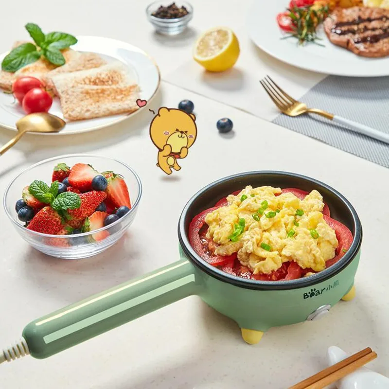 หม้อต้มไข่แบบเสียบปลั๊กขนาดเล็กสำหรับใช้ในครัวเรือนเครื่องต้มไข่อัตโนมัติเครื่องใช้ไฟฟ้าในครัว