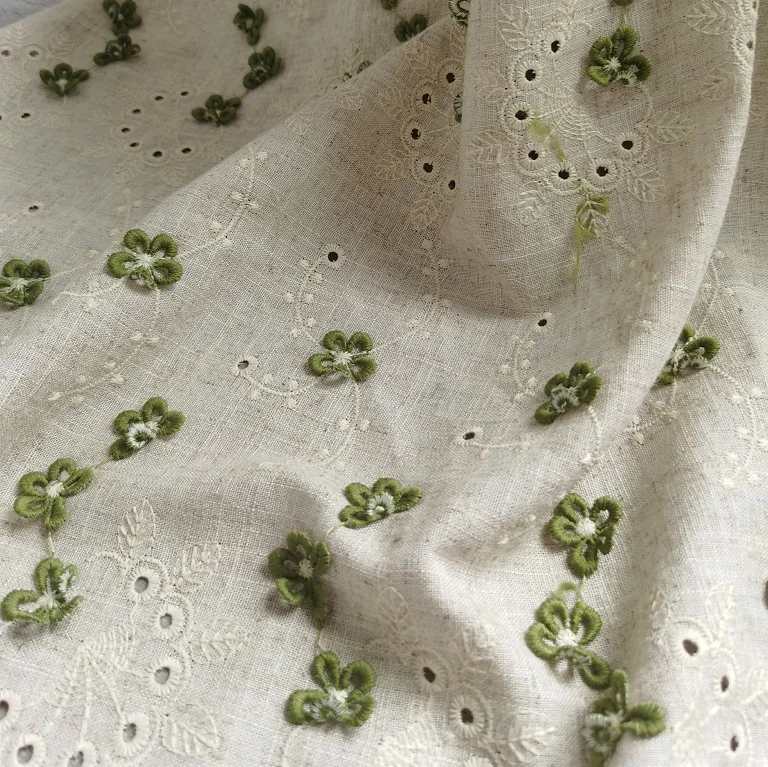 

100% linen 3D green small flower embroidered hollow fabric for women's children's clothing tablecloths curtains designer fabrics